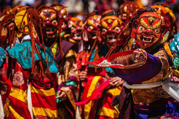 Tsholing dance at Paro Dzong during Tsechu festival in Bhutan.